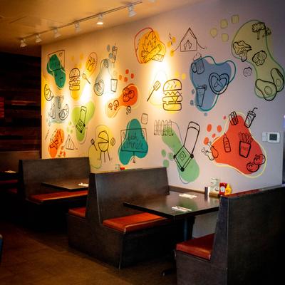 Dining area with booth tables.