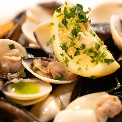 Clams and mussels with lemon, closeup