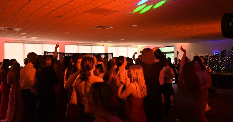 Wedding guests dancing and mingling