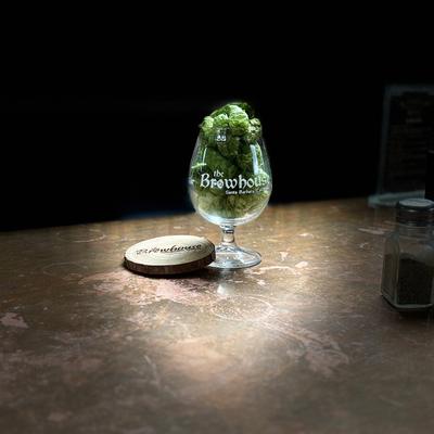 hops in a beer glass.