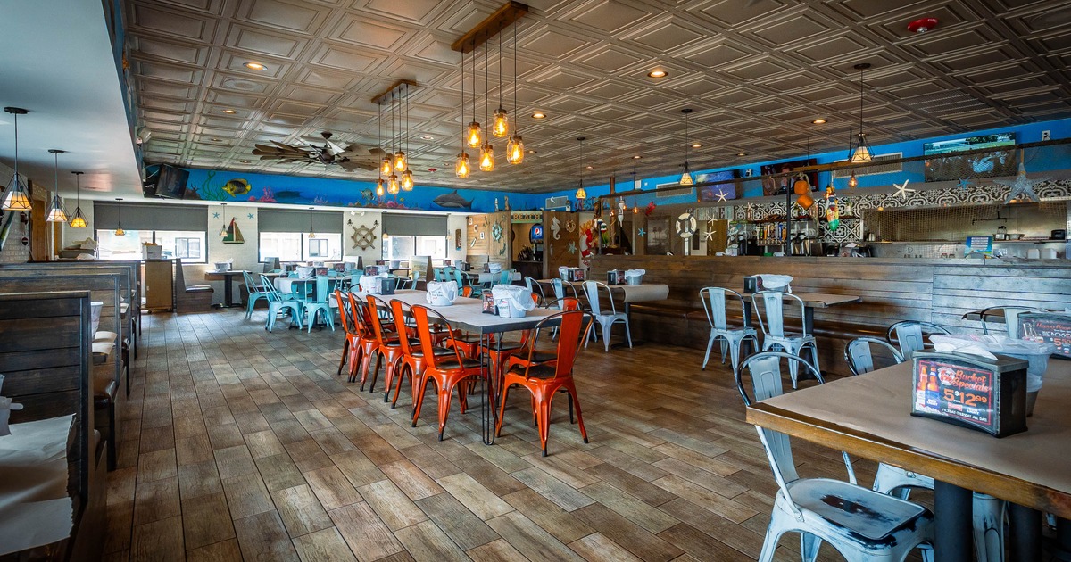 Interior, tables and chairs ready for guests