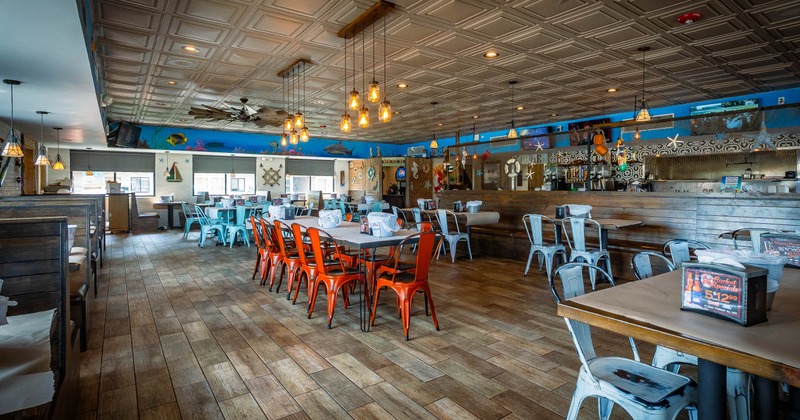 Interior, tables and chairs ready for guests