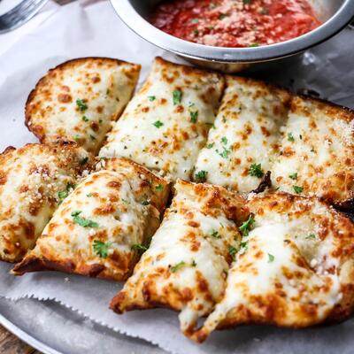 Cheese pastries with seasoning and tomato sauce dip