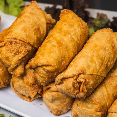 Egg rolls with chicken parmesan.