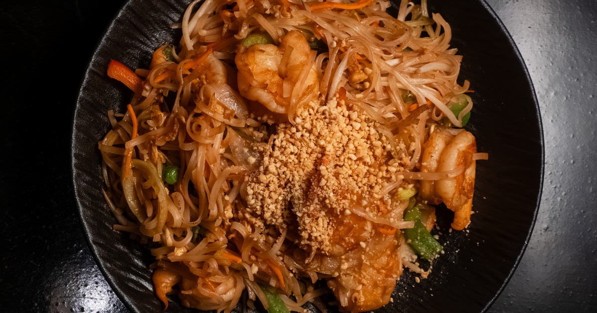 Shrimp Pad Thai topped with chushed peanuts