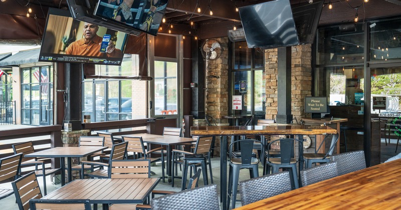 Interior, diner area, tables and chairs, wide view