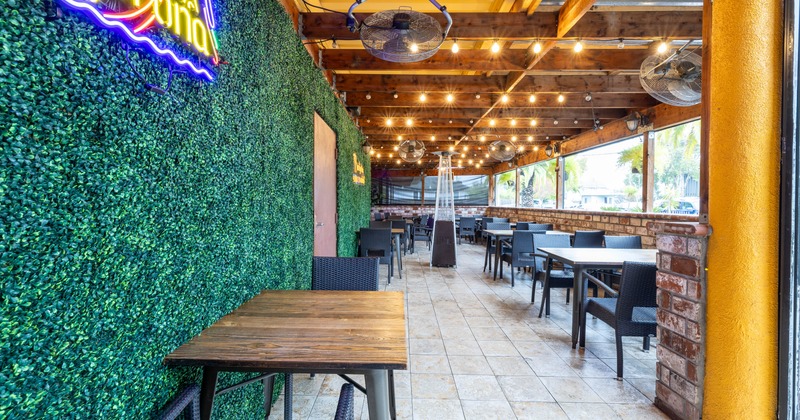 Interior seating area with chairs and tables