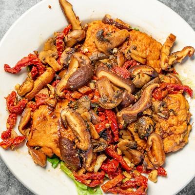 Biba's Famous Warm Chicken Salad dish.