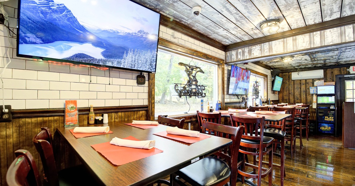 Interior, tables and chairs in dining area