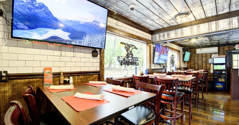 Interior, tables and chairs in dining area