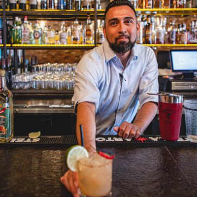 Bartender serving drinks