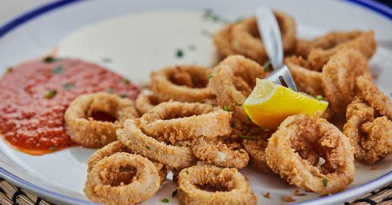 Onion rings and dip on the side