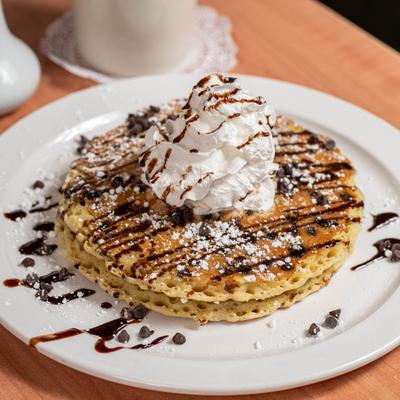 Chocolate Chip Pancakes, with whipped cream.