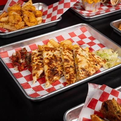 Prepared meals on trays.