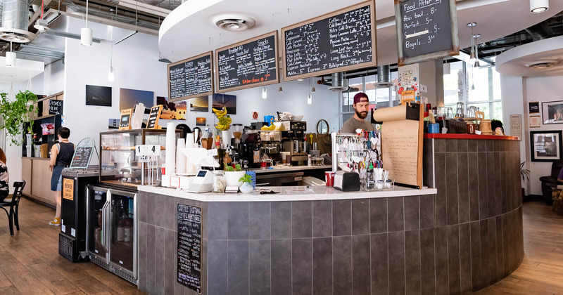 Interior, an employee behind the counter