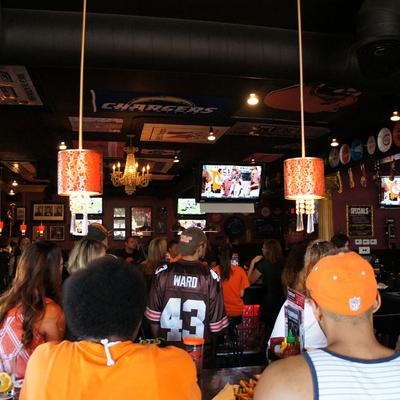 Crowd watching the game, from the back