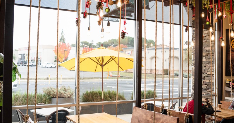 Interior, tables and chairs ready for guests