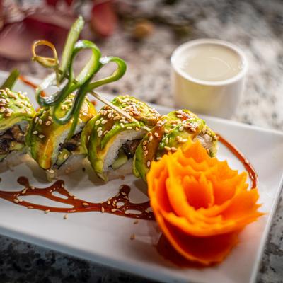 Eel sushi rolls, with avocado, cucumber, and eel sauce.