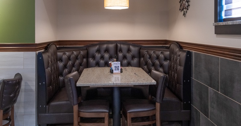 Interior, single booth, table, 2 chairs