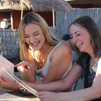 Customers browsing the menu.