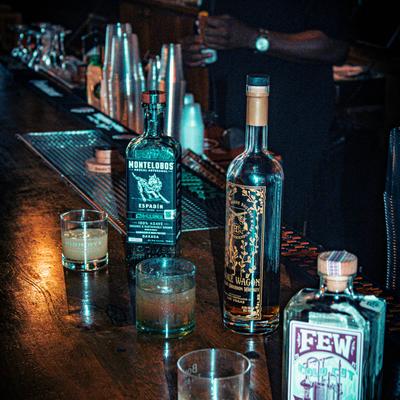 Whiskey and Mezcal bottles.