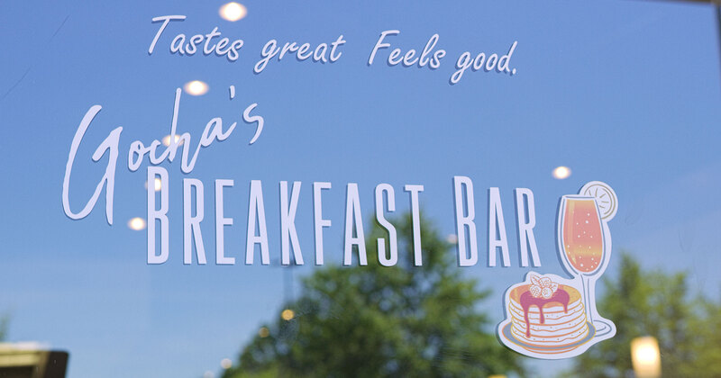 Breakfast Bar - The sign on the restaurant window