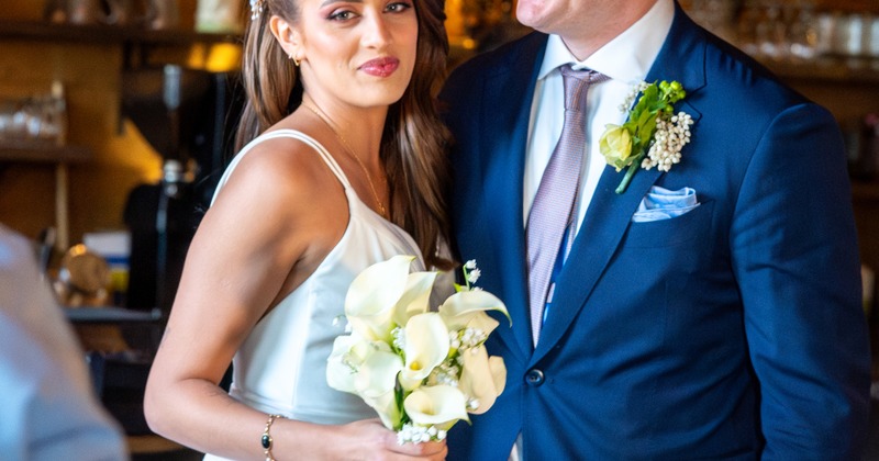Interior, two big tables with tableware and glasses
