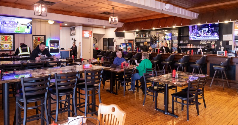 Diner area, tables and chairs, wide view