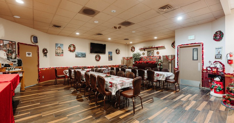 Interior, tables and chairs ready for guests