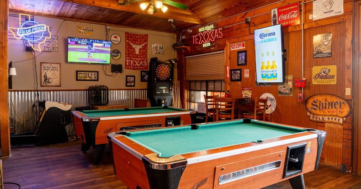 Interior, pool tables waiting for the guests