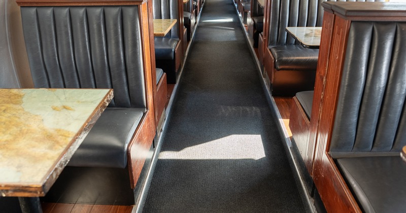 Interior of airplane restaurant, booths