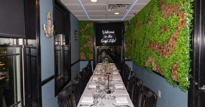 Interior, long table set and ready for guests