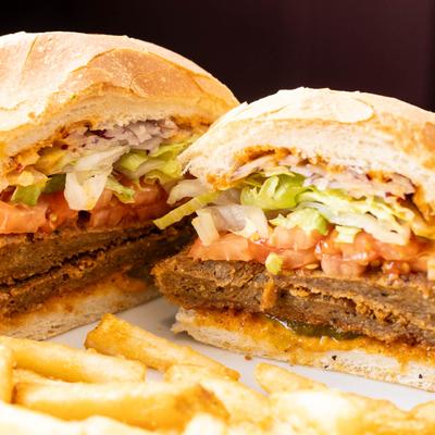 Vegan Krispy Krunch Chicken Sandwich, served with fries.