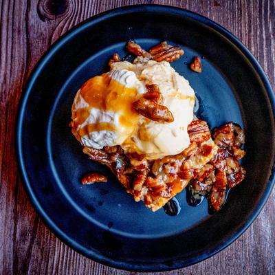 Bread pudding, with pecans, vanilla ice cream, and caramelized bourbon sauce.