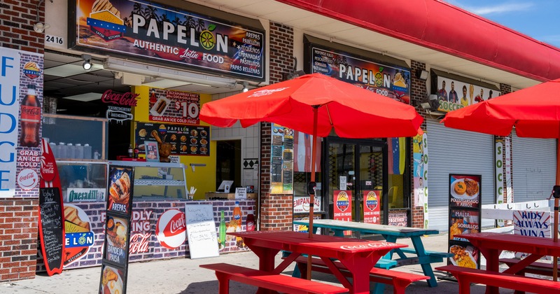 Exterior, store front with colorful benches