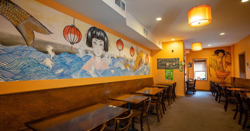 Interior - beautifully decorated wall, tables ready for guests