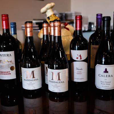 Assorted wine bottles.