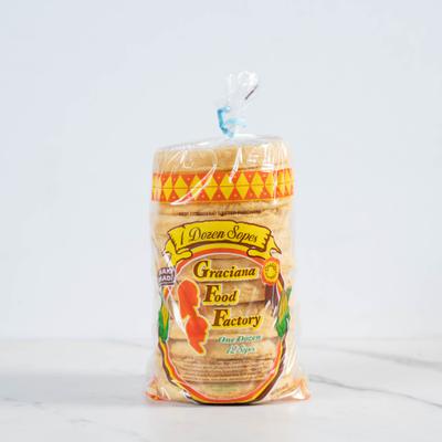 Corn tortillas packaged in a clear bag.