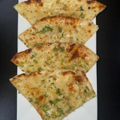 Cheesy garlic naan bread.