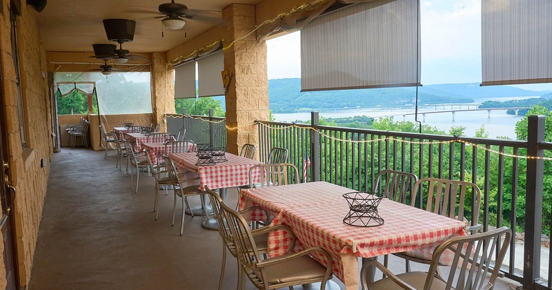 Covered patio area, tables ready for guests