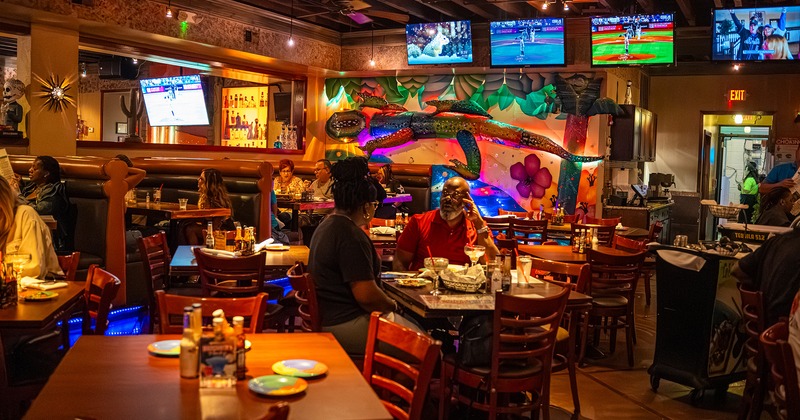 Interior, dining area, guests enjoying their food and drinks