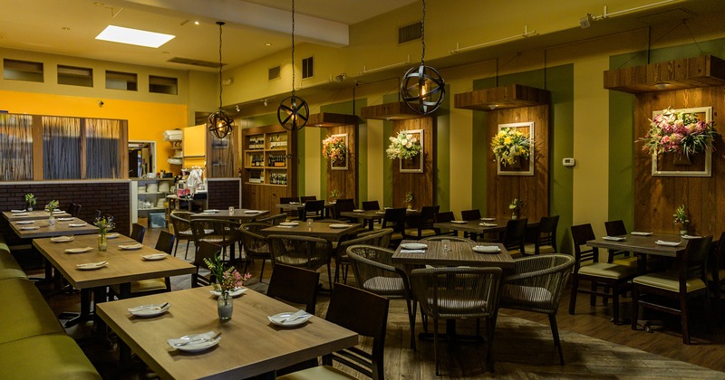 Restaurant interior, dining area with set tables