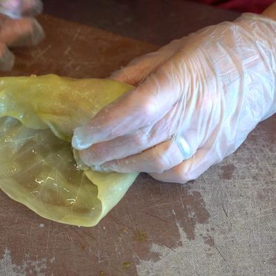 Chef making a cabbage roll.