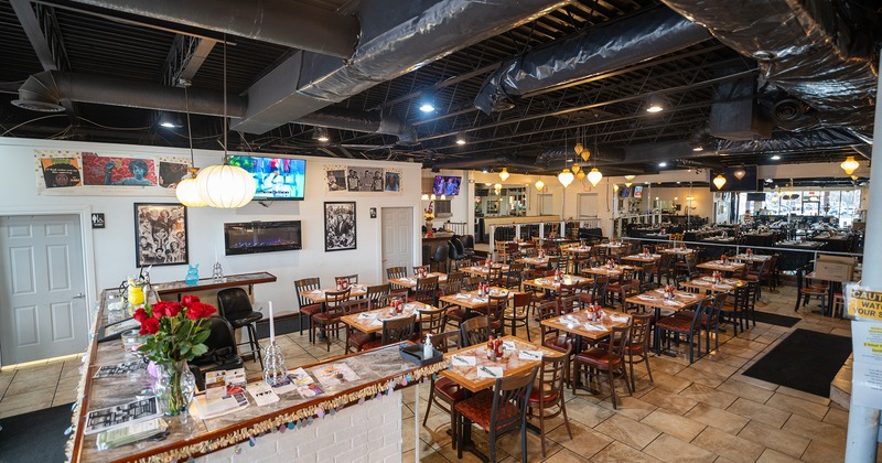 Interior, dining area with set dining tables ready for guests