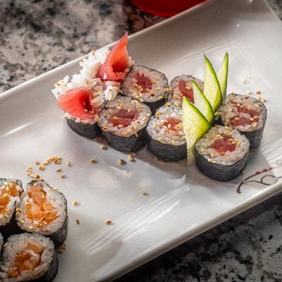 Tuna and salmon rolls wrapped in seaweed.