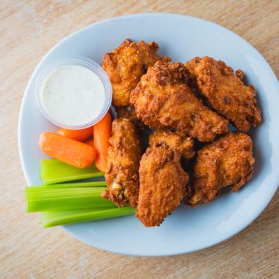 Wing dings with celery, carrots, and ranch dip.