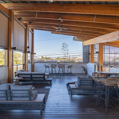 Tables and chairs at the covered patio