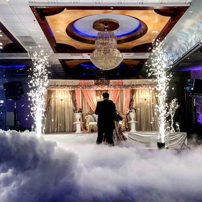 A wedding room space with smoke and fireworks.