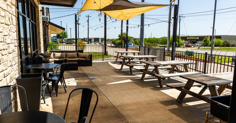 Exterior seating area with picnic benches