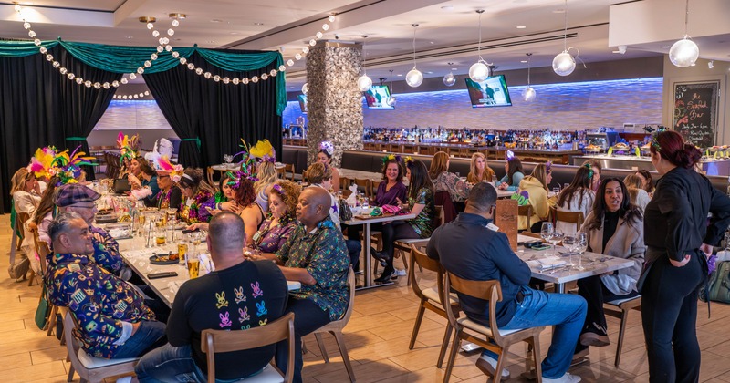 Interior, dining space with joined tables for group parties